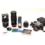 A Pentax ME Super camera and Tamron 80-210mm lens, plus Hoya 52mm lens