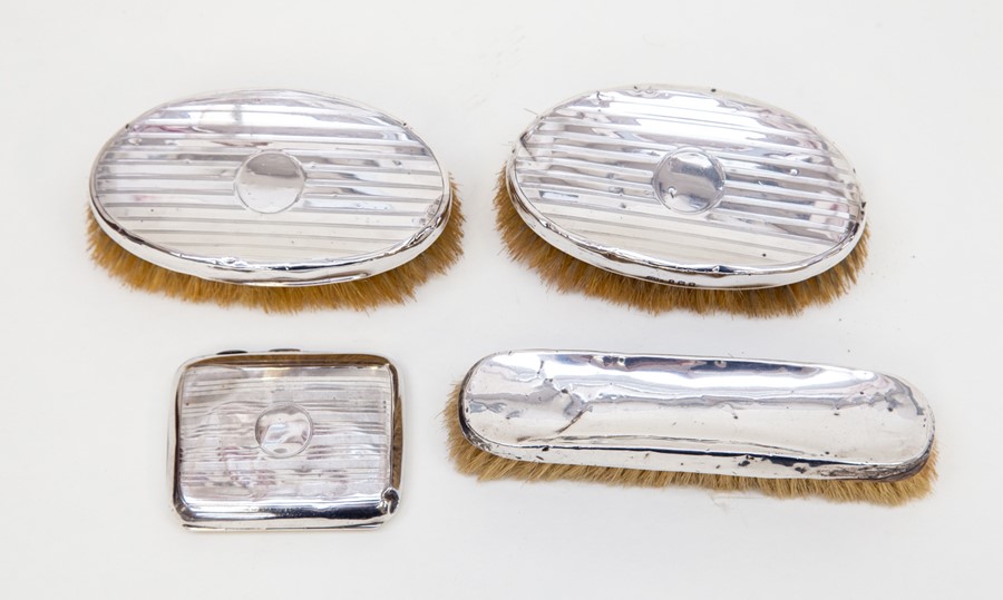 A brush set with silver back along with a silver cigarette case, Birmingham 1924  A/F