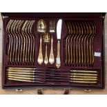 A 20th Century Bestecke canteen of gold plated Solingen cutlery, in brown case, approx setting