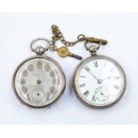 Two silver pocket watches, to include a white enamel version with subsidiary, numerals along with