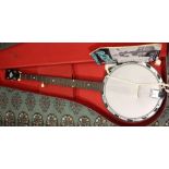 A cased John Grey five string banjo, a cased guitar and a Jolli Joe banjo (3)