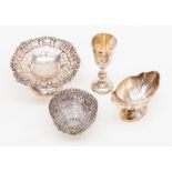 A Silver Jewish Kiddish cup, a bonbon tazza, filigree basket and a silver boat shaped  condiment (