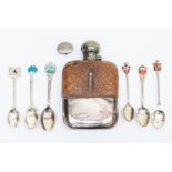 Plated hip flask with leather cover and six spoons with a silver pill box