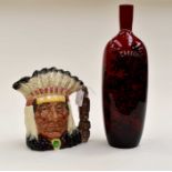 Royal Doulton flambé woodcut 1617 vase, 35cm high and North American Indian character jug D6611,