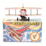 Tinplate and plastic battery operated stunt plane, made in Japan by TPS (Tokyo Playthings), boxed
