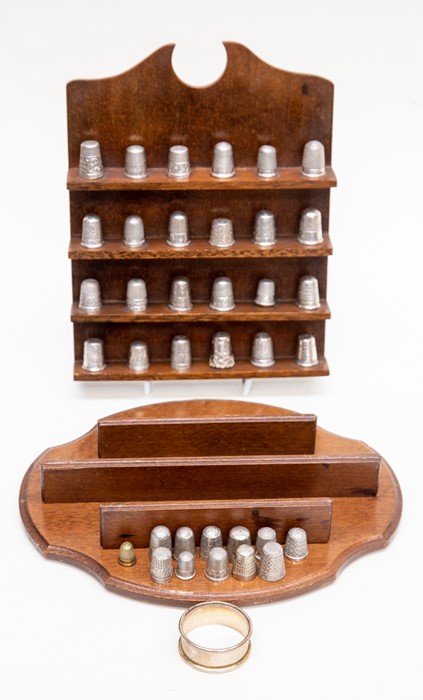 A collection of late Victorian and early 20th Century thimbles, various dates and makers, together