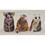 Royal Crown Derby paperweights of a koala, panda and a bear, with silver stoppers
