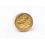 A half sovereign ring, mounted in 9ct gold, size U,  total gross weight approx 9.4 grams