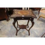 **AWAY** An early 20th century side table, carved decoration of four thistles with an oval centre,