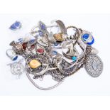 A collection of ethnic white metal jewellery to include stone set bangles, bracelets, pendants,