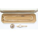 An Avia ladies bracelet watch; a duo strand of Lotus fashion pearls and a brooch