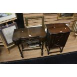 A 20th Century oak hall table; similar pot cupboard