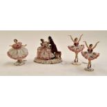 A group of Continental ballerina statues and a couple