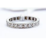 A diamond set full eternity ring, grain set round brilliant cut diamonds set in platinum, total