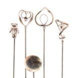 Three Edwardian Charles Horner silver hat pins, Chester 1909, 1910, 1911; a silver teddy bear hat