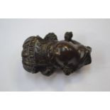 A treen netsuke of a standing frog, signed