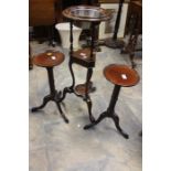 A George III mahogany wig stand on tripod cabriole feet; two similar wine mahogany tables (3)