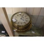 An 8 day brass ships clock