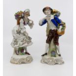 A pair of Dresden late 20th Century figures of lady with fruit basket and matching male partner