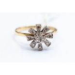 A diamond flower cluster ring set, 18ct gold, size M1.2 total gross weight approx. 3.5gms