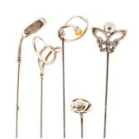 Three Charles Horner silver hat pins, and two other including a golf club (5)