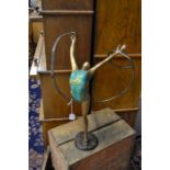 An Art Deco style female figure in painted brass, approx 45 cms in height
