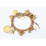 A 9ct gold charm bracelet, to include various charms including a half sovereign 1909, a toad with