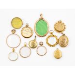 A collection of Victorian and Edwardian 9ct gold and gilt metal glass hair lockets and pendant