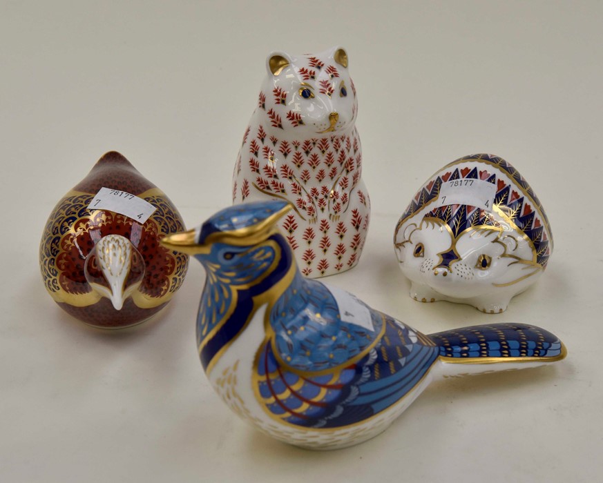 Royal Crown Derby paperweights of two pheasants, bear with silver stoppers along with a hedgehog