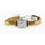 A lady's gold-plated Longines bracelet watch, cushion shaped rectangular white dial, numerals,