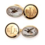 A pair of Essex crystal cufflinks, painted with flying mallards, stamped 18ct, with later 14ct