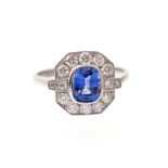 ***AUCTIONEER TO ANNOUNCE WEIGHT CHANGES ****An Art Deco style sapphire and diamond ring, comprising