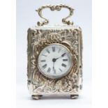 A Victorian silver cased carriage clock, the circular enamel dial with Roman numerals, within a