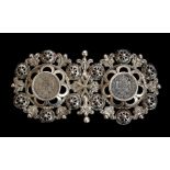 An 18th/19th century Maltese silver buckle, the circular pierced and scroll work buckles joined by a