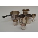 A collection of French silver, including three beakers and tot, various sizes and decoration,