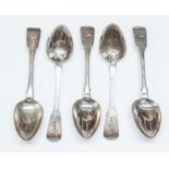 A set of five George III silver Fiddle pattern table spoons, each handle engraved with a crest (en