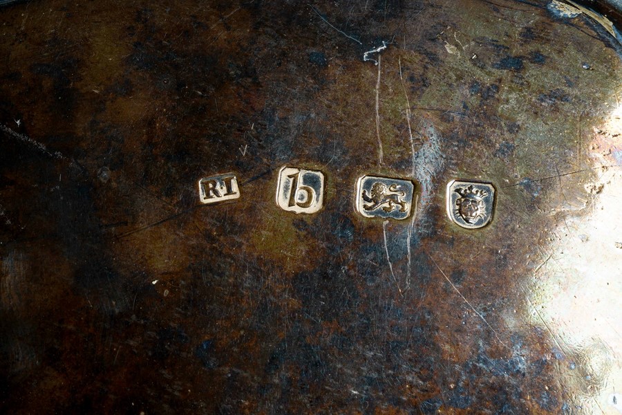 A matched pair of George III silver salvers, beaded rim above three shell and scroll feet, the - Image 2 of 2