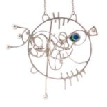 Norman Grant- A Modernist circa 1970's silver pendant in the form of a fish, open wire work design