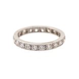 A diamond full set eternity ring, set with round brilliant cut diamonds with a total diamond