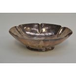 An Art Deco silver plain shaped hexagonal lobed oval bowl, on plain oval foot, Josiah Williams &