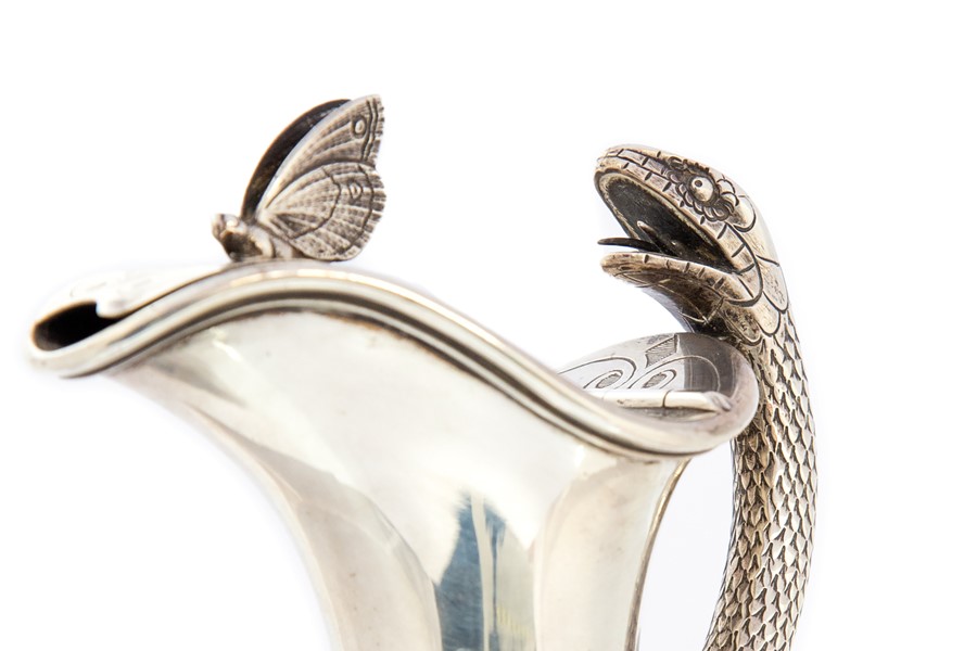 A Victorian silver snake handled ewer and cover, baluster shaped body engraved in the Etruscan style - Image 5 of 7