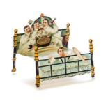 Collection of four Victorian chromolithographic 3-D/pop-up Christmas cards: free-standing bed with