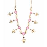 An Edwardian opal, pink tourmaline and diamond fringe necklace, comprising seven alternating