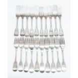 A composite set of twenty early to mid 19th Century silver Fiddle pattern table forks, each handle