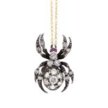 A diamond set spider pendant, the body set with round brilliant-cut diamonds, with diamonds set to