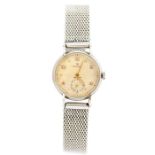 Rolex, a mid 20th Century lady's steel Rolex Precision wristwatch, 2cm circular champagne dial