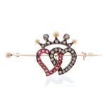 A Victorian double heart brooch,  entwined hearts set either side with spinels and old cut diamonds,