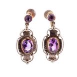 Murrle Bennet & Co - A pair of Arts and Crafts amethyst silver drop earrings, each with central oval