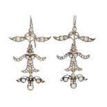 A pair of Victorian garland style diamond set drop earrings, the floral and stylised bow design