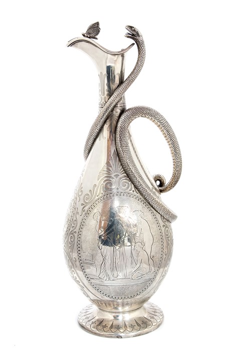 A Victorian silver snake handled ewer and cover, baluster shaped body engraved in the Etruscan style